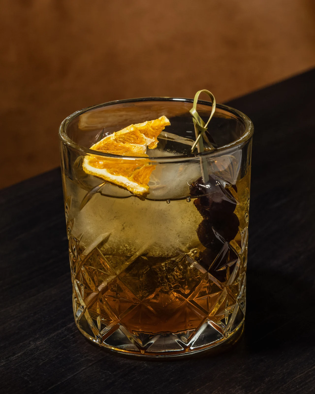 Origen’s Señor Old Fashioned in a cut-glass tumbler with an orange garnish